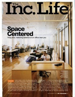 A magazine cover with people in an office.